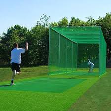 A cricket practice net setup