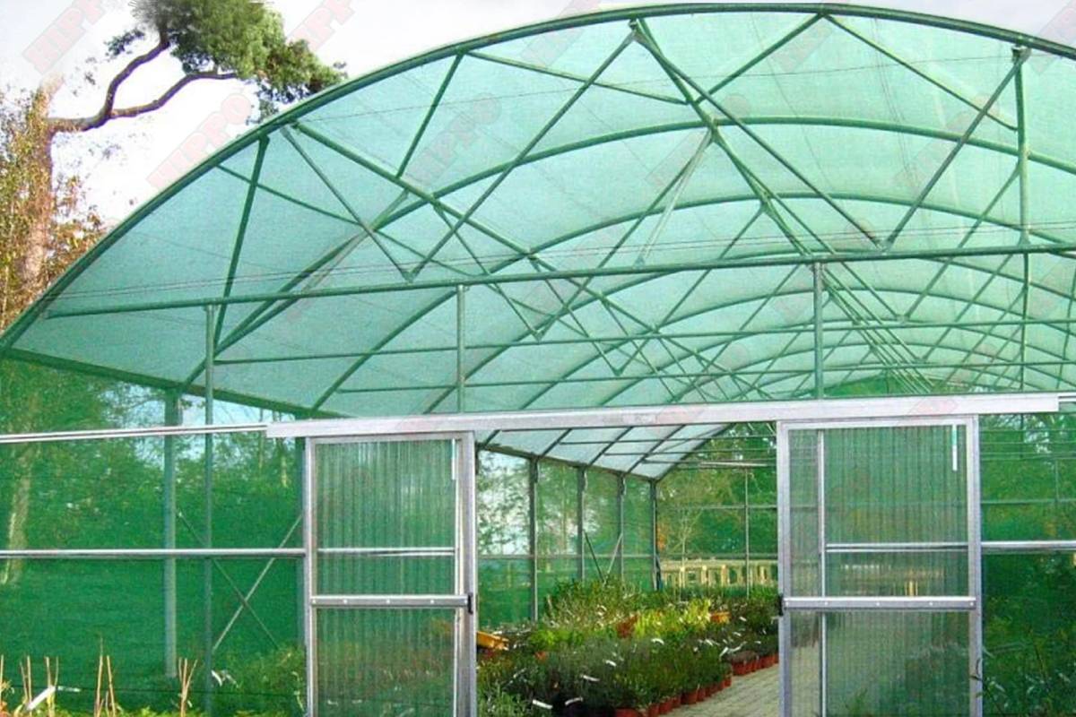 A car parking area covered with shade nets