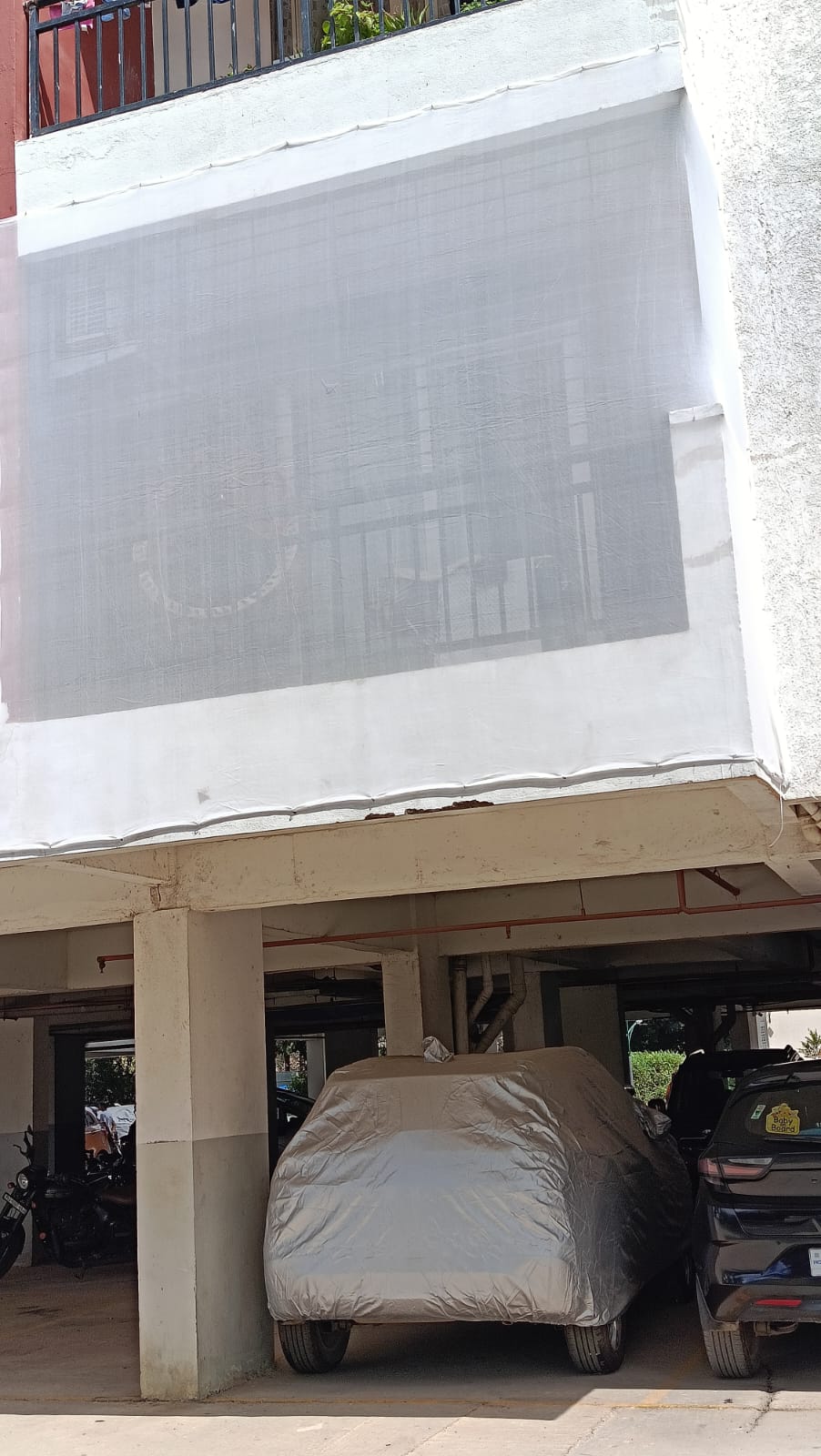 A window fitted with a mosquito net